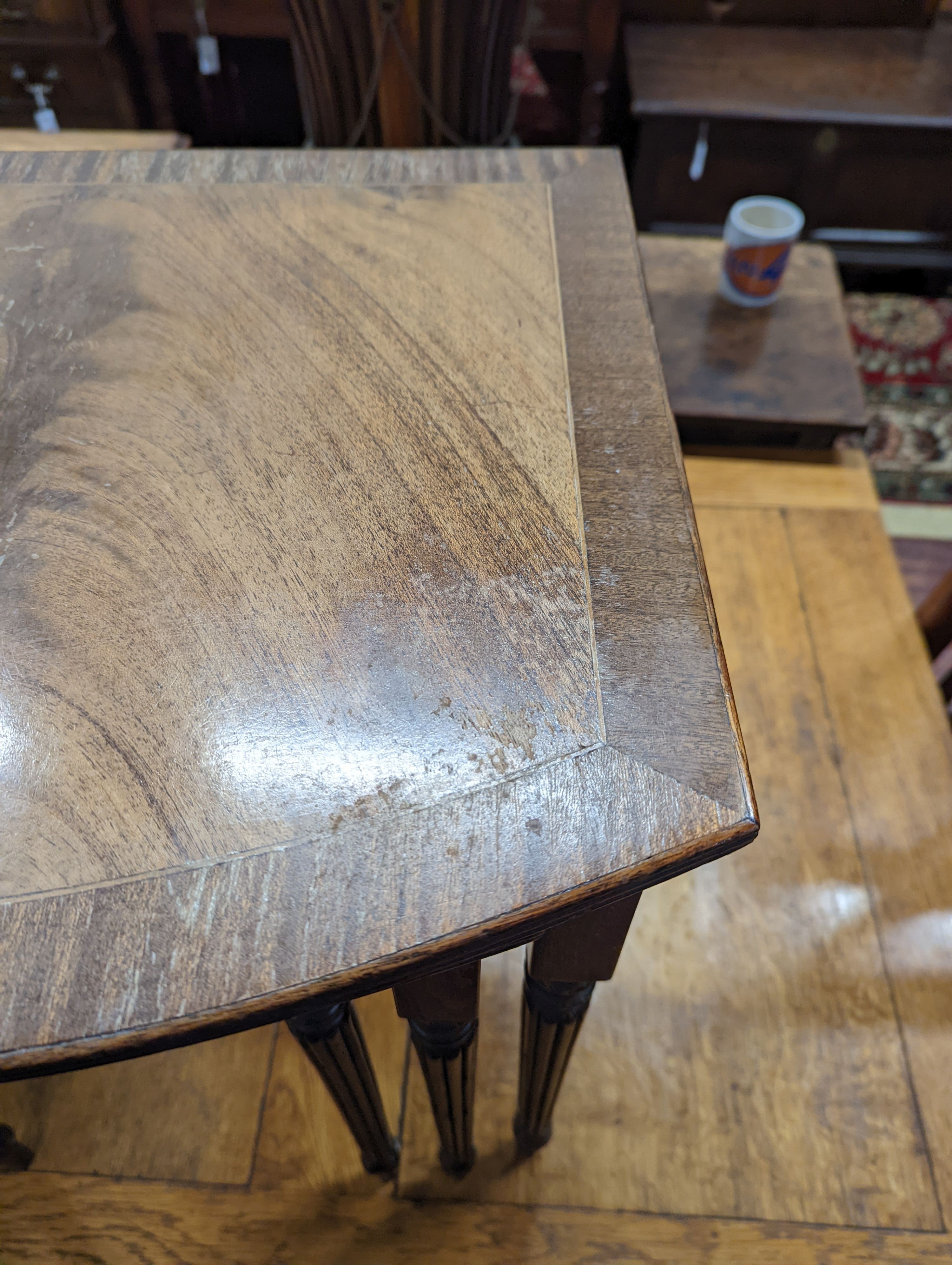 A Victorian walnut nursing chair together with a reproduction nest of tea tables